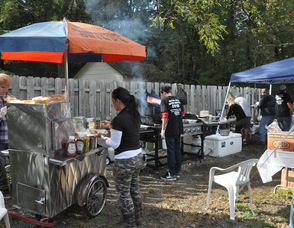 Clams, hot dogs, and other items being cooked up at the event.