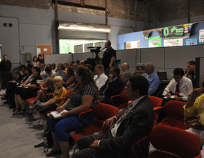 The crowd listens as Samuel Burlum introduces shareholders and employees.