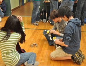 New Providence High School students put the finishing touches on their car.