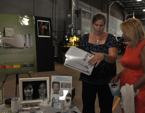 Aileen Healy discusses the products with a client.