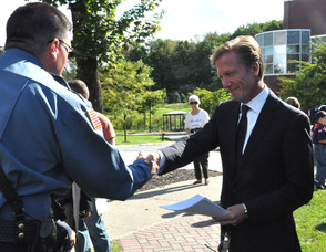 N.J. Burkett meets Newton Police Chief Michael Richards.