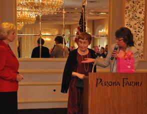 Ailish Hambel and Lieutenant Governor Kim Guadagno present an award to Thea Unhoch, former Town of Newton Mayor and Councilwoman.