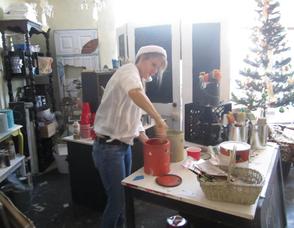 A woman mixing paint