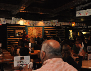 Diners watch students from the Birykov Academy perform.