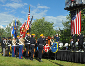 Members of the military present the colors.