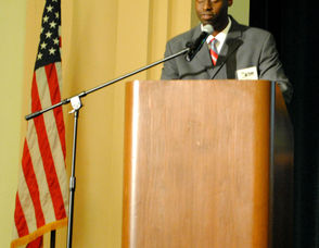 Principal Hayden Moore begins the evening by welcoming students, parents, and staff.