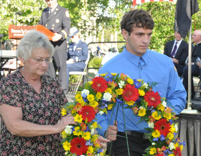 Kevin Pettenger, a High Point Regional High School Graduate, and Nicki Dobias, 50-year county resident, carry the civilian wreath.