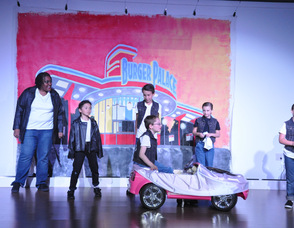 A car onstage for "Greased Lightning".