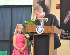 Thomas S. Russo, Jr., with Jaylin Bash.