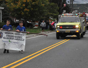Sussex County Community College Public Safety Training Academy marches down Ogdensburg's Main Street.