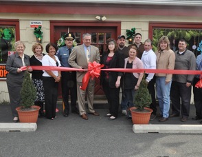 Those who celebrated the ribbon cutting included: Nancy Woods of the Greater Newton Chamber of Commerce, Florence Watts of the Greater Newton Chamber and Sussex Bank, Vita Thompson Andover Township Clerk/Administrator, Andover Township Police Chief Gil Taglialatela, Andover Township Mayor Michael Lensak, Rae Ann Martin, husband Jim Martin, son Kyle Martin, Sandra Diglio of the Greater Newton Chamber of Commerce and Town of Newton Deputy Mayor, Martin's nephew Dustin Izzi, Martin's sister Jody DeYoung, Joe Stickles of the Greater Newton Chamber of Commerce, and Jonathan Andrews of the Springboard Shoppes and Greater Newton Chamber of Commerce.