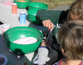 kids painting pumpkins