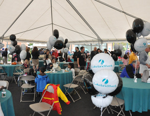 Families enjoy the festivities at Lakeland Bank.