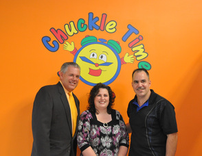 Andover Township Mayor, Michael Lensak, with Chuckle Time owners Dawn and George Hudock.