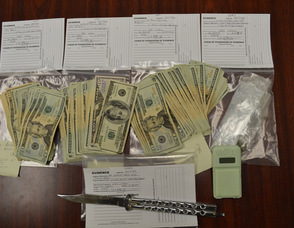 A Sparta High School senior is facing drug and weapon charges after he was caught in the school parking lot with $4,450 in cash, drugs and a knife (Photo courtesy of the Sparta Township Police Department).