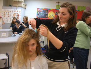 Michaella Barracato styles Elizabeth Henning's hair.