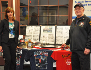 Michele Hennessy, Branch Service Manager, and Thomas Cooney at the display.