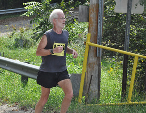Keith Glasgow finishes the 10K.