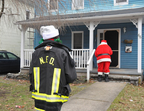 Santa and an elf make a stop.