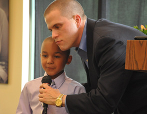 Thomas S. Russo, Jr. listens to the response of Kasai Goritski.