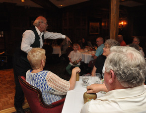 Werner Goebel cues guests to ring their cowbells.
