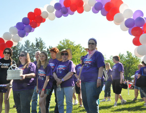 Cancer survivors line up for the first lap.