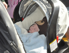 One of the youngest in the parade, Crosby Bryant, only three weeks old.