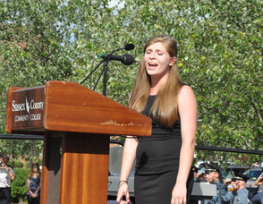 Kelly Wask sings the National Anthem.