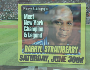 Poster at the dealership advertising Strawberry's visit.