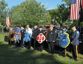 Special floral arrangements about to be carried to the memorial.