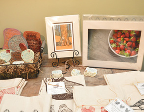 Photography by Rob Yaskovic (right) overlooks farm-inspired items, also on display.