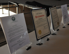 Proclamations from Sussex County municipalities on display.