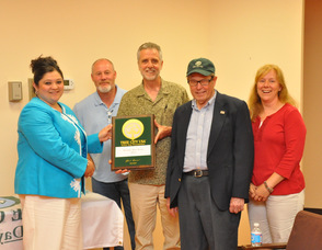 The Shade Tree Commission presents the plaque to Mayor Helen Le Frois.