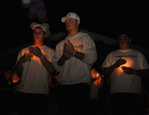 The shirts and hats on these three participants proclaim they are "relentless against cancer".