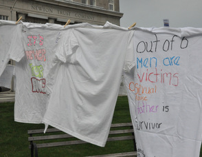 The t-shirt on the right discusses the impact on men.