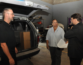 Zaida Collazo with Extreme Energy Solutions' Bruce Dillon, and Samuel K. Burlum. 