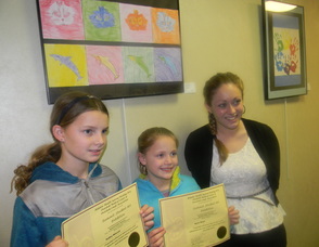 Art teacher Jaimie Bass with some of her students
