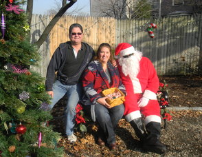 Chatham Chamber of Commerce members Michael Goodnight and Carolyn Cherry with Santa