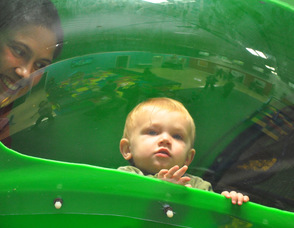 Evan Delaney, age 16 months, in one of Chuckle Time's tunnels with his mother, Courtney. It was his first time at Chuckle Time with his mother, and father, Jim, who attended the grand opening event from Hopatcong.