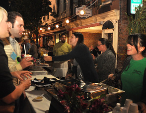 Evin Joyce, with Sydney Joice-Casey, serve up Chicken Pot Pie for O'Reilly's Pub.