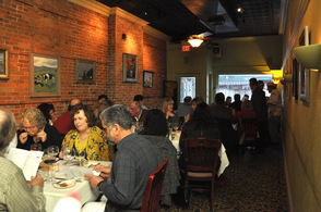 Diners at the event in one of Andre's Restaurant & Wine Boutique's dining room.