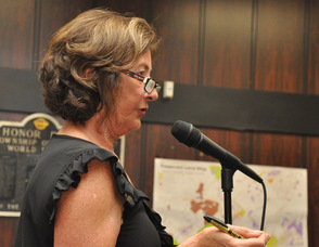 Resident Marel Albrecht at the microphone.