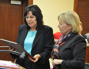 Mayor Sylvia Petillo presents the proclamation to Deborah Berry-Toon, Executive Director of Project Self-Sufficiency.
