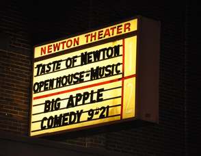The Newton Theatre announced the Taste of Newton, and their open house, on their marquee.