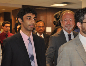 Dharun Ravi walks into the courtroom with his attorneys.