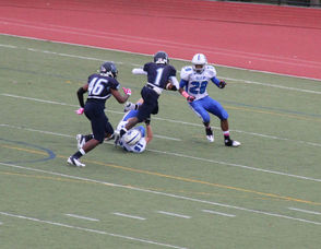 #1 Irvin Paye running hard late in the fourth quarter and would eventually score.