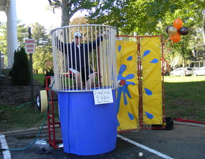 a father in the dunk tank