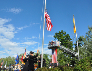 The flag being raised.