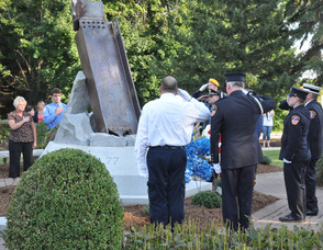 Honoring the wreaths at the memorial.