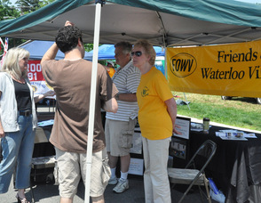Friends of Waterloo Village (George Graham and Susan Zellman), speak with passerbys, including Borough Clerk, Ellen Horak.